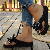 Matilda Sheridan | Polka Dot Wedge Flip-Flops With Bow Detail