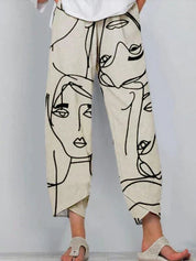 Chloe Patterson | Abstract Face Print Relaxed Trousers For Women