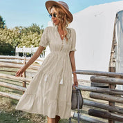 Clara Pennington | Striped V-Neck Summer Dress