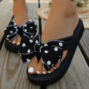 Matilda Sheridan | Polka Dot Wedge Flip-Flops With Bow Detail