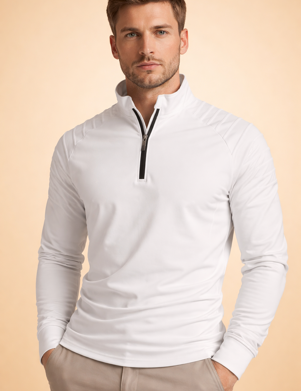 polish-male-model-white-quarter-zip-top-warm-sand-studio-posed-upper-body.png